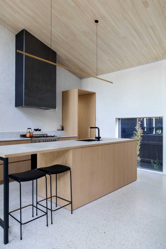 Open kitchen in light wood