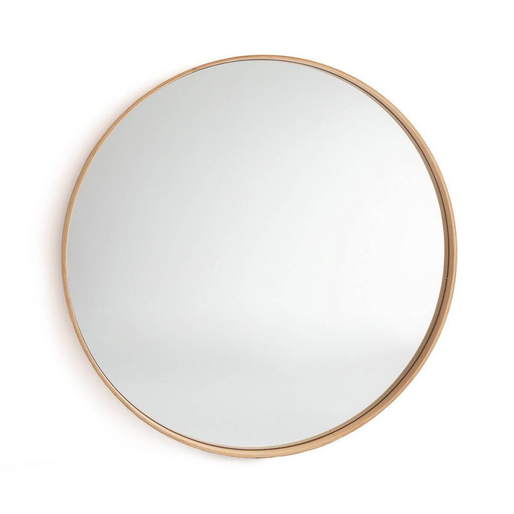 Un miroir rond en bois